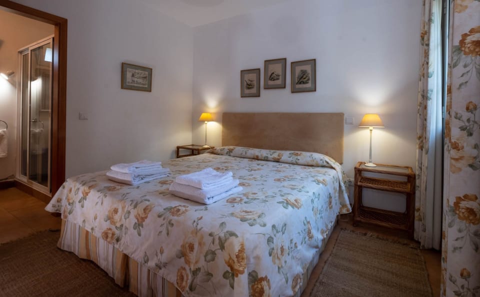 Cottage, 1 Bedroom | 1 bedroom, in-room safe, blackout drapes, iron/ironing board