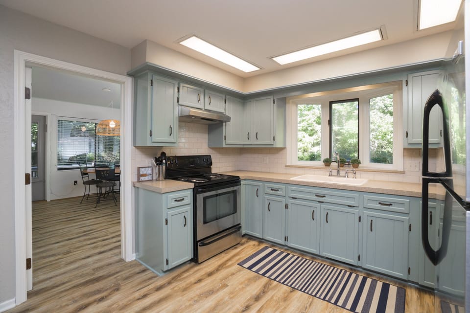 Spacious, updated kitchen is open to the great room and sunroom