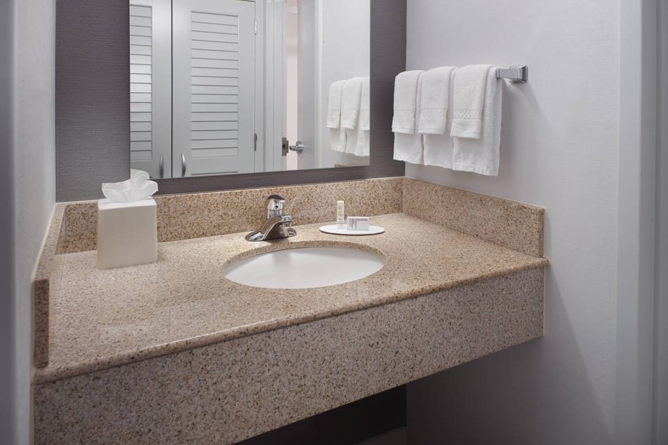 Combined shower/tub, eco-friendly toiletries, hair dryer, towels