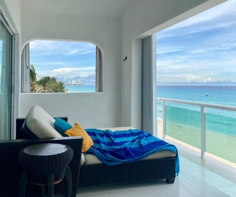 Relax in the Private Balcony and watching our beautiful beach