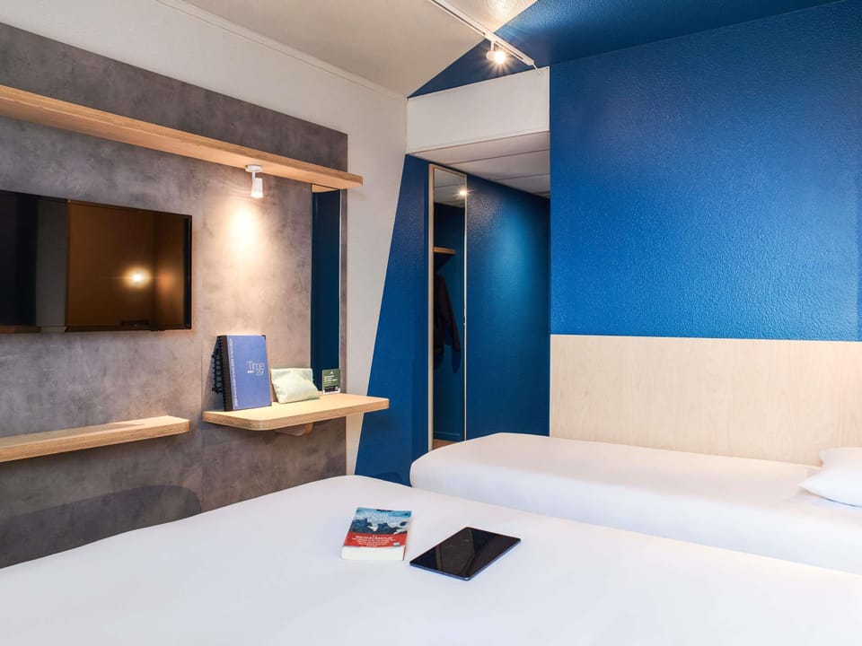 Triple Room, Multiple Beds | Hypo-allergenic bedding, desk, laptop workspace, blackout drapes