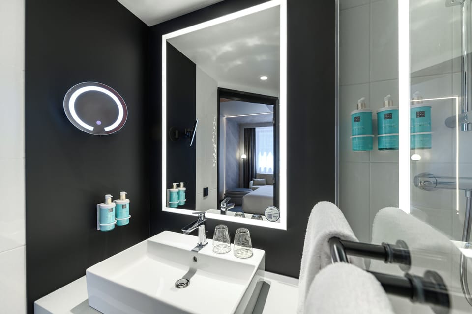 Eco-friendly toiletries, hair dryer, towels, soap