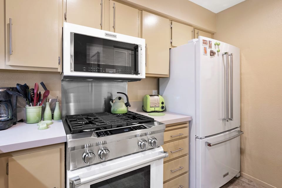 Kitchen with top of the line Kitchenaid commercial style gas range