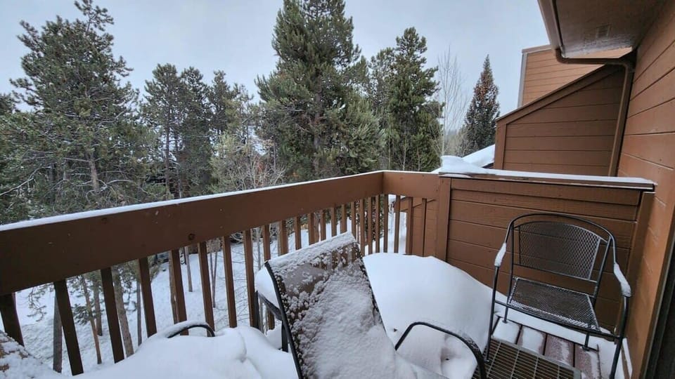 The home features two outdoor balcony/patio areas where you can enjoy the surrounding views and fresh mountain air.