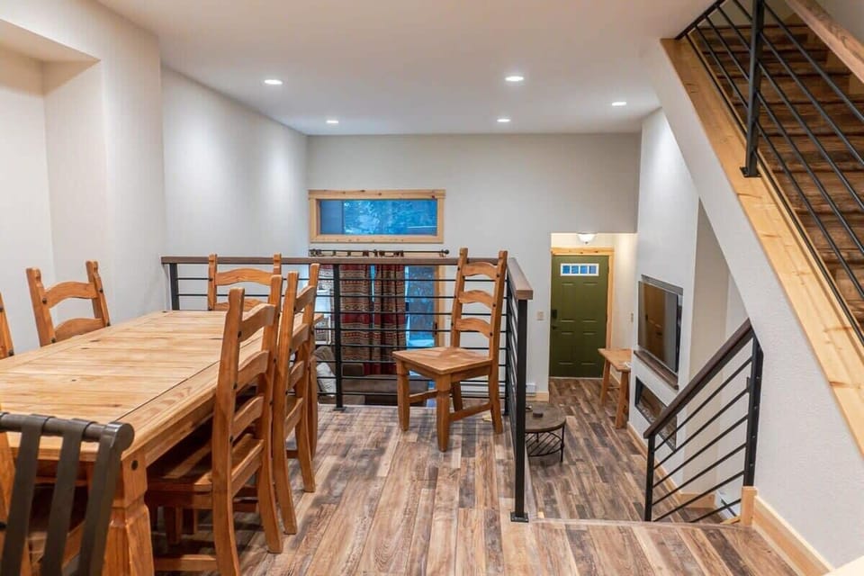 The dining area is located a few steps up from the living room conveniently located next to the kitchen.