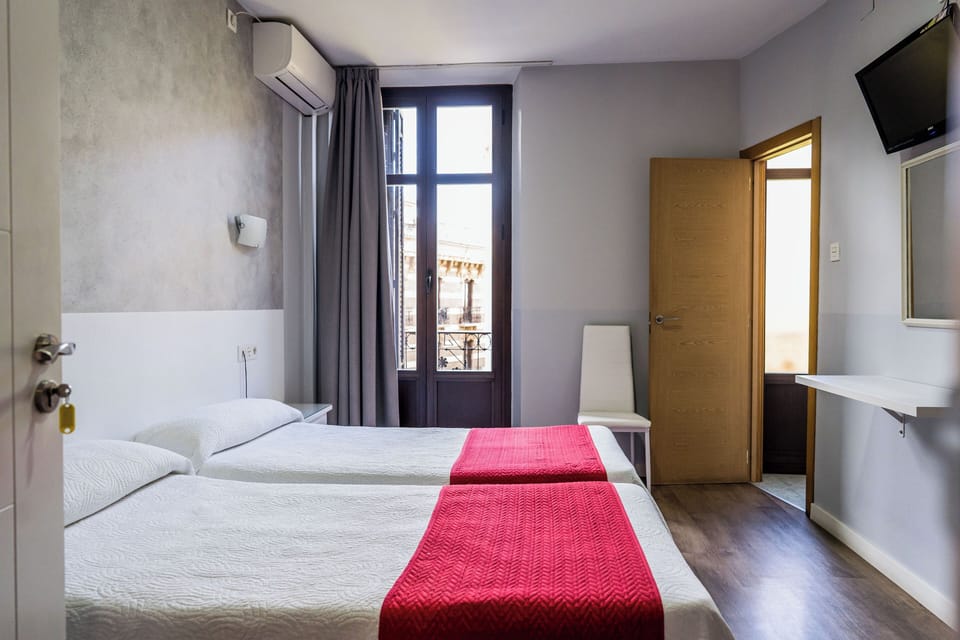 Standard Double Room | Desk, blackout drapes, iron/ironing board, free WiFi