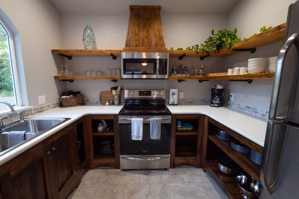 Cottage "B" kitchen
Open shelving for easy find . Quartz counter tops