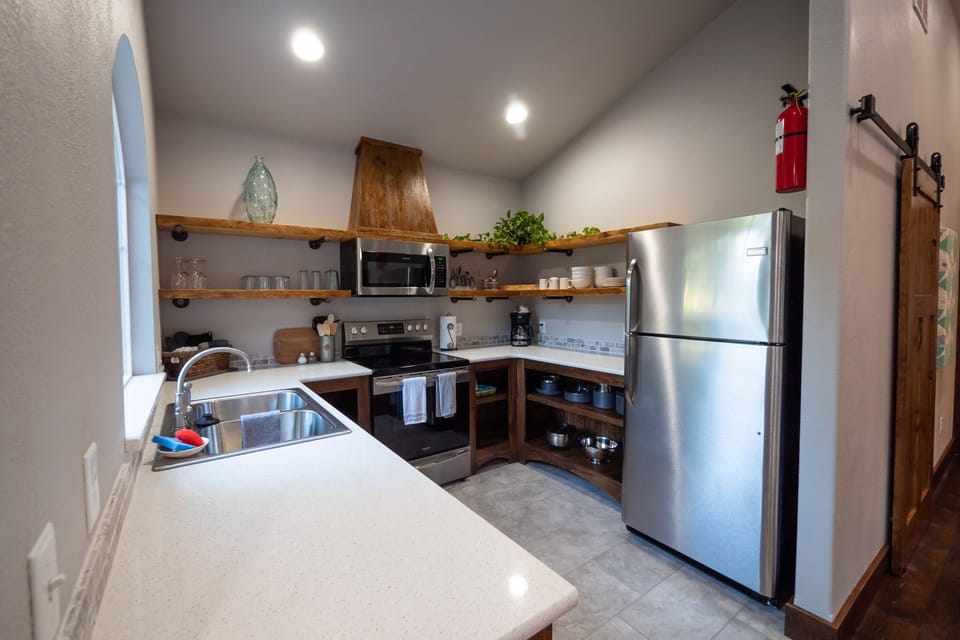 Cottage "B"  kitchen
tile floors and custom cabinets