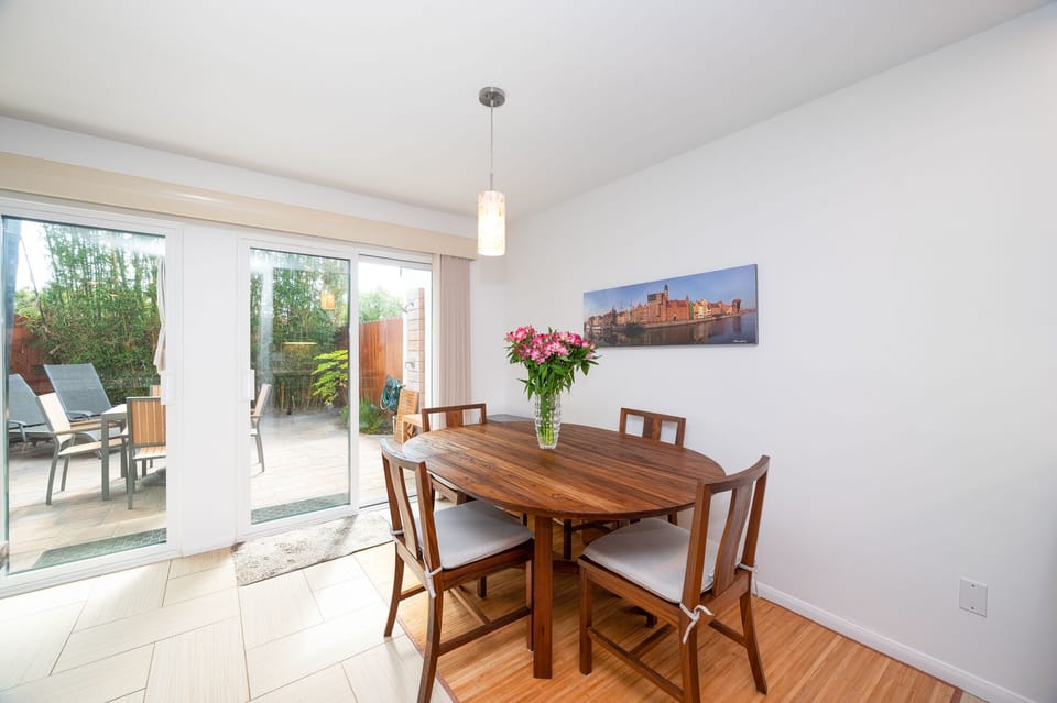 Lovely dining room. New sliding doors to the private back patio.
