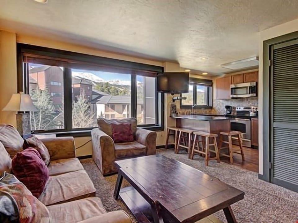 Kick back your feet and relax in the spacious, bright living room.