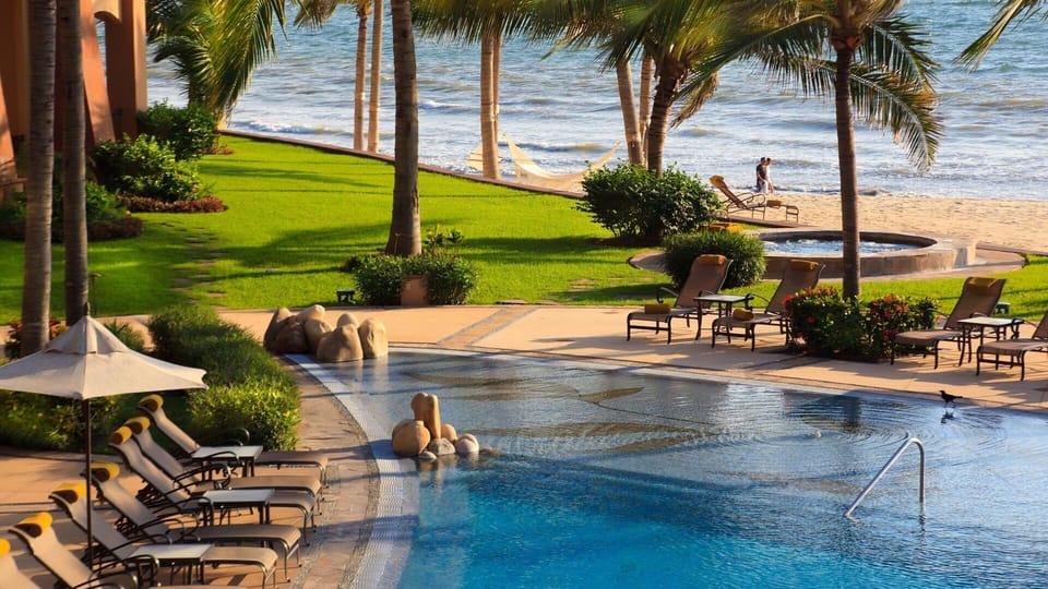 Partial poolside view with "beach like" shallow end, great for kids.
