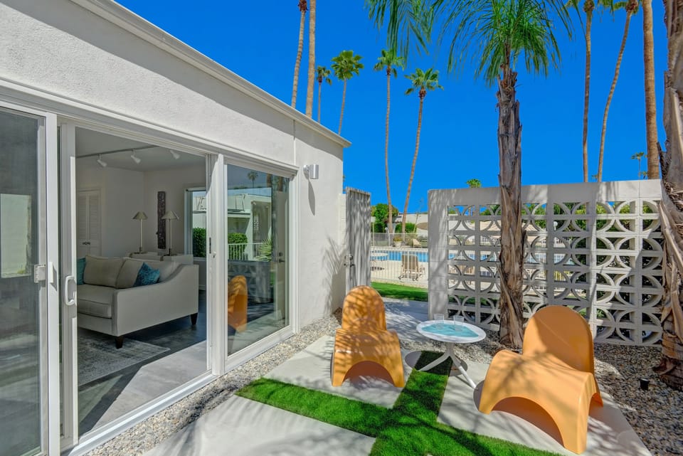 PATIO OUT TO POOL - Oranj Palm Vacation Homes.jpg