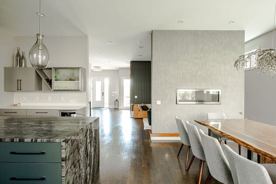 Luxury finishes, including a double sided fireplace and marble countertops.