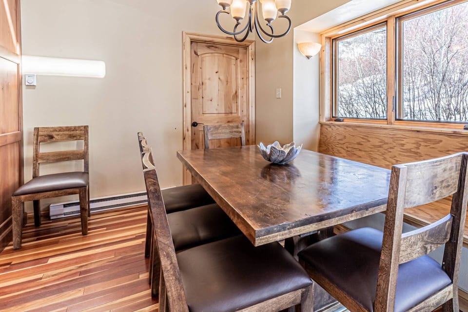 Gather around the spacious dining table—perfect for family meals and shared moments.