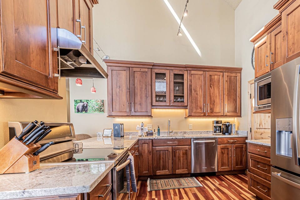 Well-equipped, spacious kitchen designed for home-cooked meals and group gatherings.