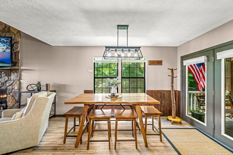 Dining area with seating for seven guests.