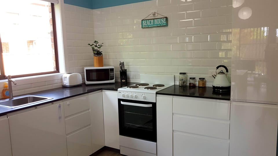 Modern Kitchen full of cookware.