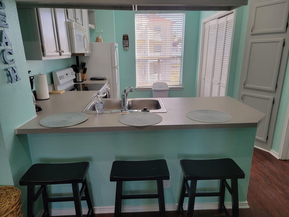 Kitchen has breakfast bar