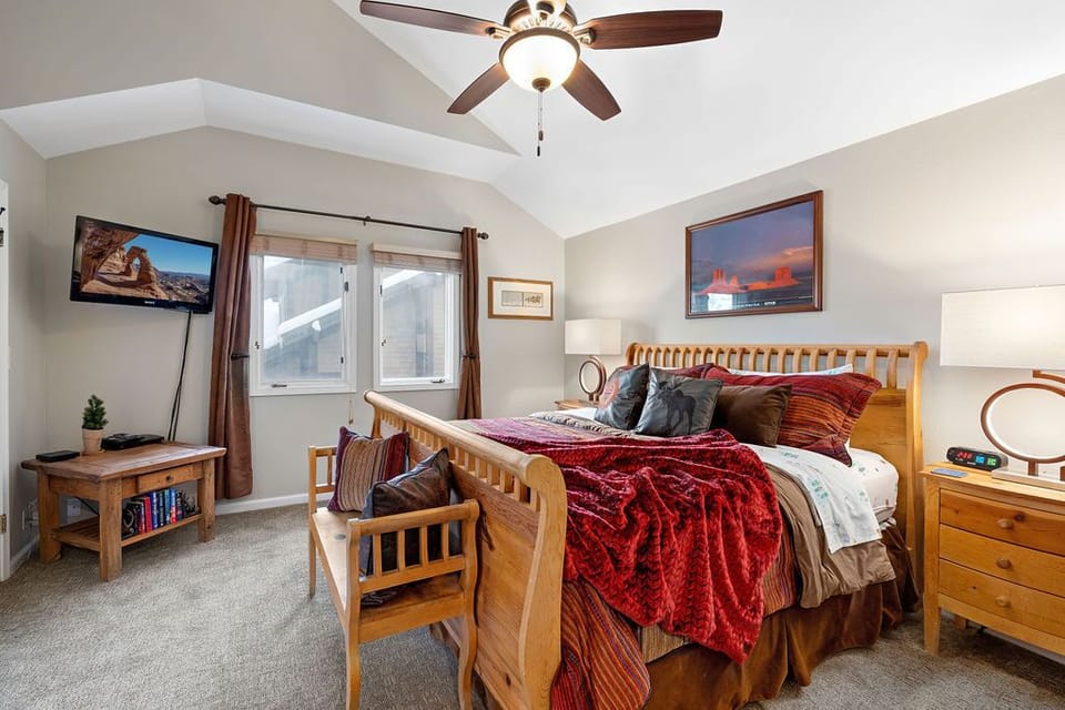 Spacious master suite with comfy king bed (upper level)