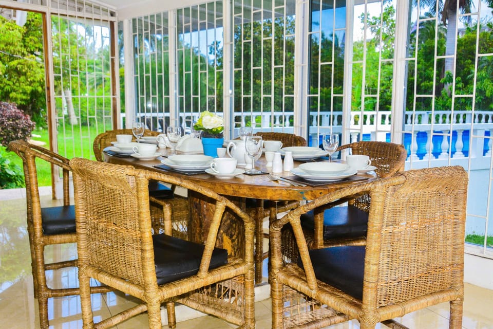 Stunning dinning area overlooking our swimming pool also fruited gardens with seating for 10 people