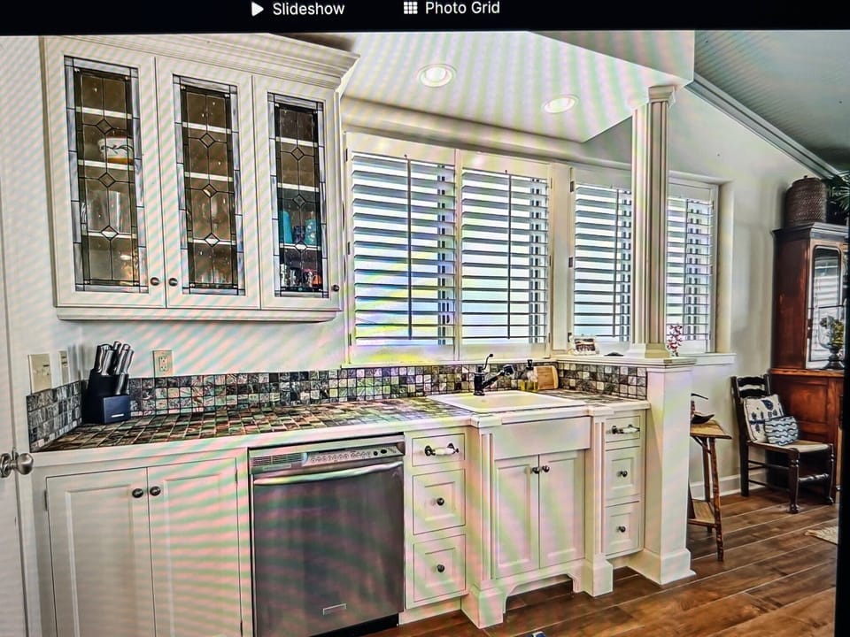 Kitchen sink/dishwasher area.