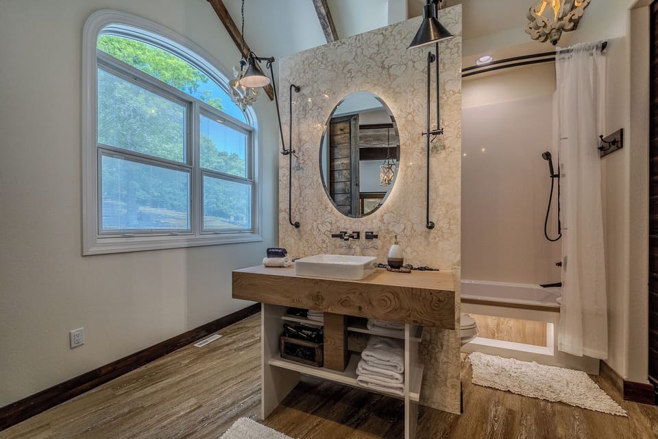 Modern tub w/ soothing lights and massage features; both kids and adults love.  