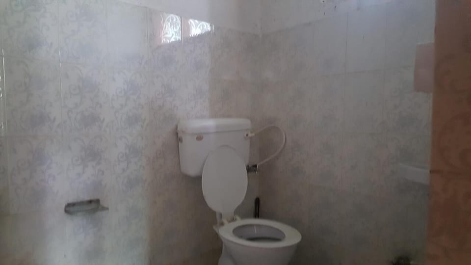Shower, rainfall showerhead, slippers, towels