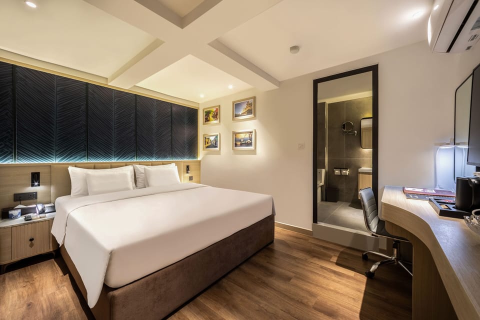 Superior Room, 1 Queen Bed, No Windows | Minibar, in-room safe, blackout drapes, iron/ironing board