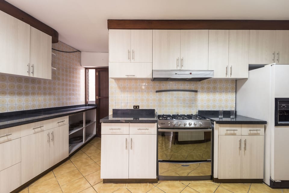 Family House, 5 Bedrooms, Non Smoking, Private Bathroom | Private kitchen | Full-size fridge, microwave, oven, cookware/dishes/utensils