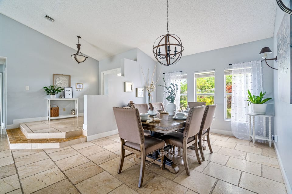 Vaulted, spacious Formal Dining Room with seating for 6.