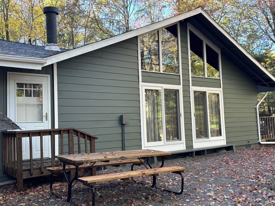 Our house from the front. Large picnic table.