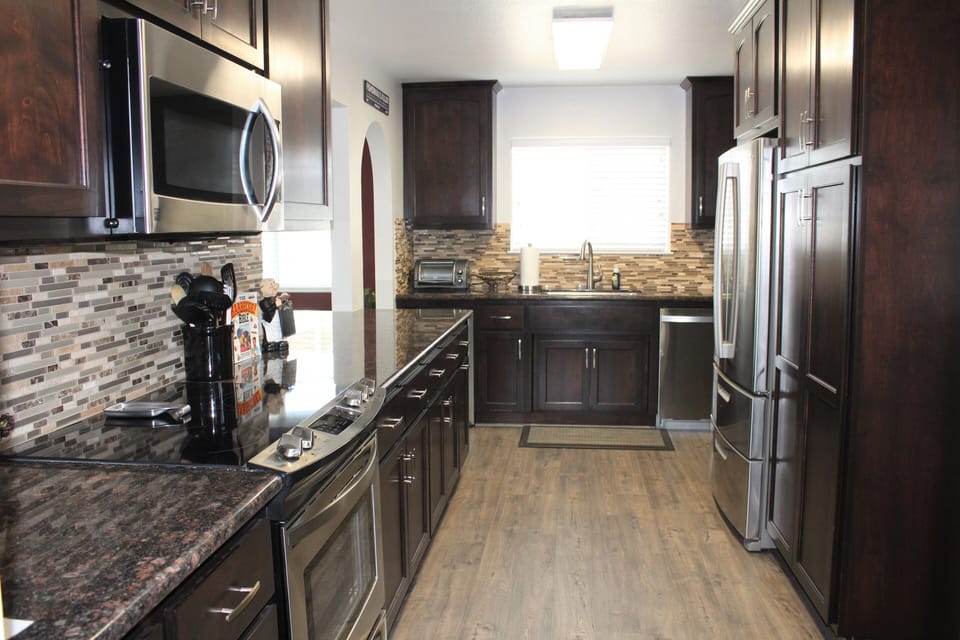 Kitchen has just about anything you could need for serving, eating, and cooking.