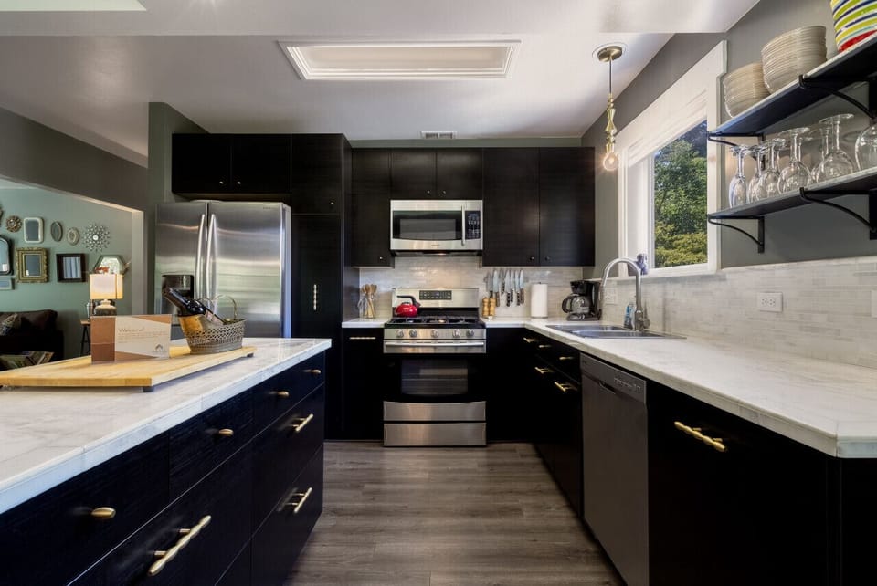 Kitchen equipped with 12 Cup drip coffee maker, coffee provided