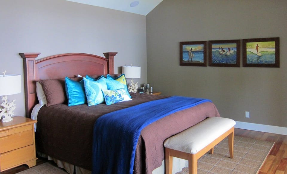 Upstairs primary room, king bed, luxurious bathroom, spacious ocean-front lanai