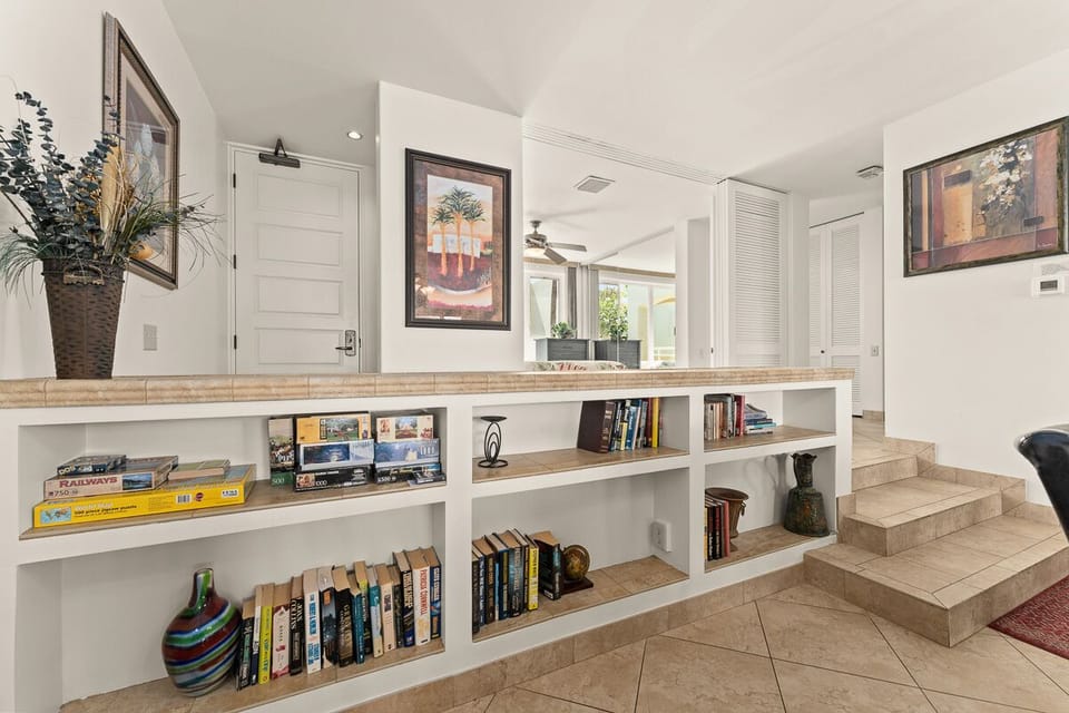 Custom built in book case and game area