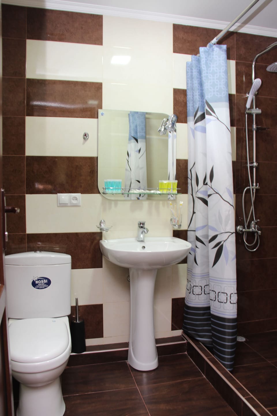 Shower, free toiletries, slippers, towels