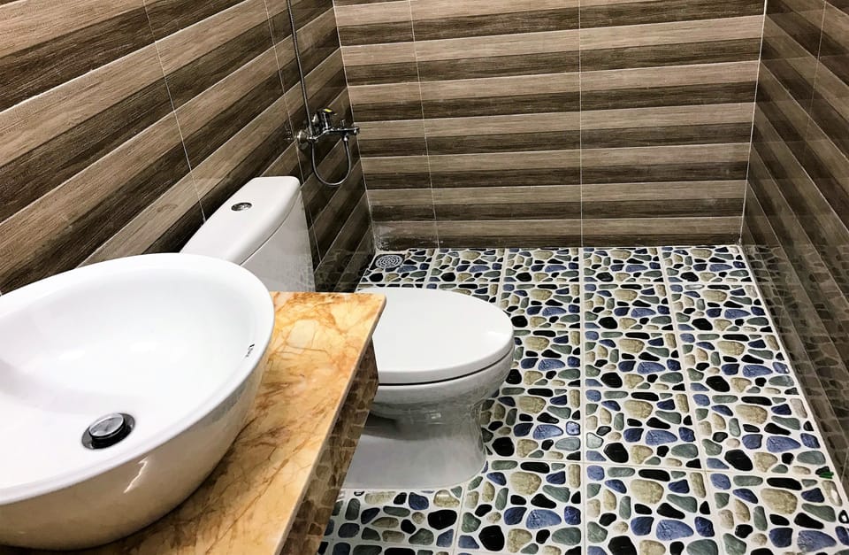 Shower, free toiletries, hair dryer, slippers