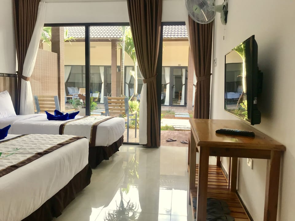 Standard Triple Room, Garden View | Garden view