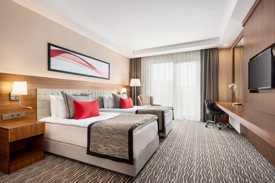 Egyptian cotton sheets, premium bedding, minibar, in-room safe