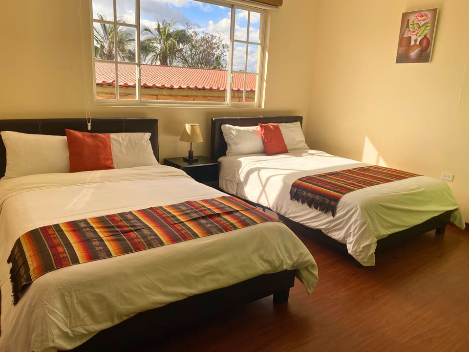 Standard Triple Room, 2 Double Beds | 2 bedrooms, blackout drapes, iron/ironing board (on request)
