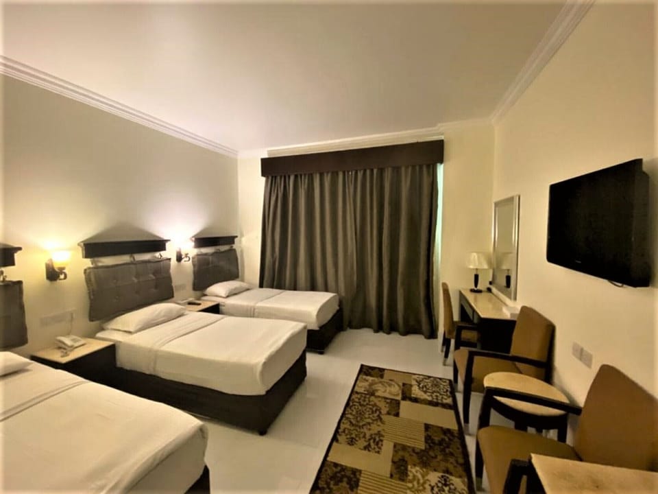 Triple Room, Pool Access | Egyptian cotton sheets, premium bedding, minibar, in-room safe