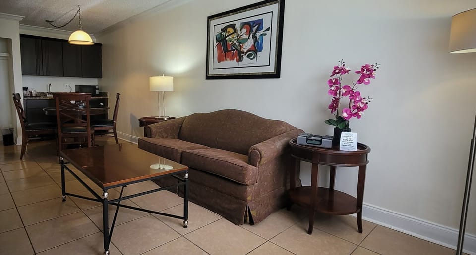 Suite, 2 Queen Beds, Poolside | Living area | Flat-screen TV