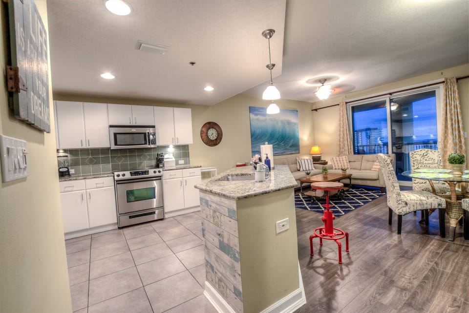 Condo, 1 Bedroom, Balcony, Beach View (2-202) | 1 bedroom, desk, iron/ironing board, free WiFi