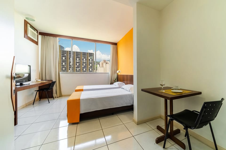 Twin Room | Minibar, desk, free WiFi, bed sheets