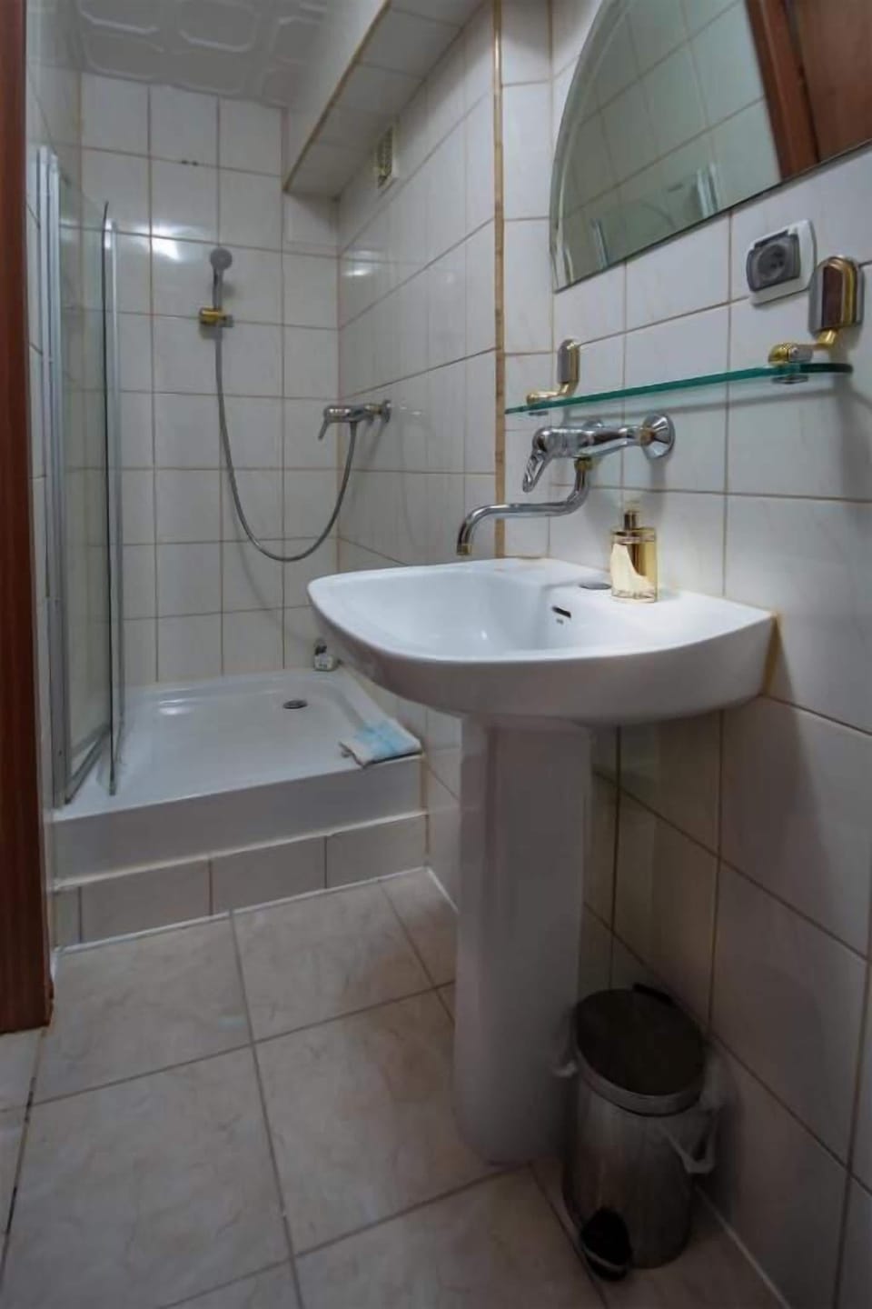Shower, rainfall showerhead, hair dryer, towels