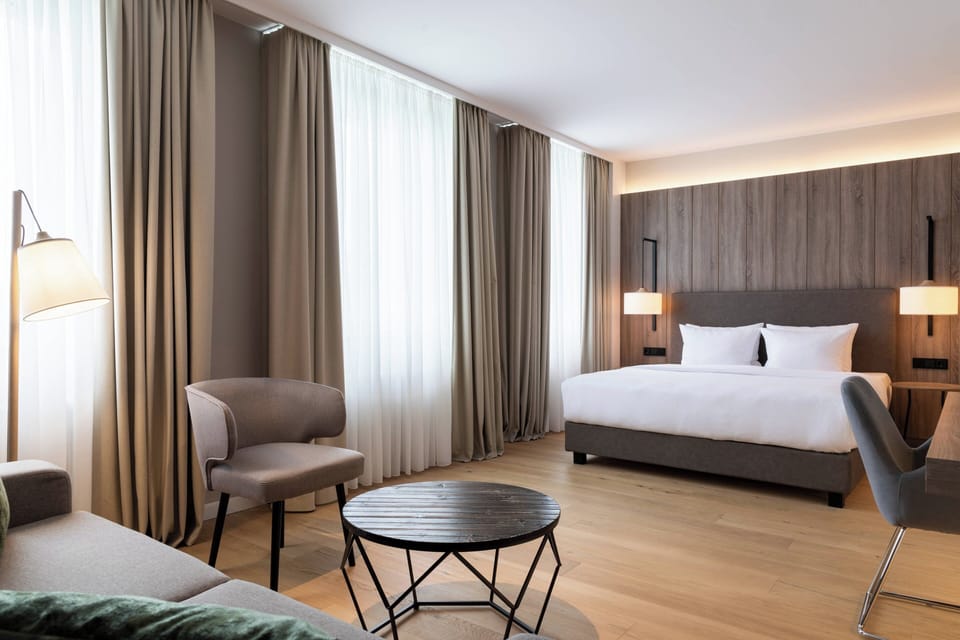 Junior Suite, 1 King Bed with Sofa bed | Pillowtop beds, minibar, in-room safe, desk