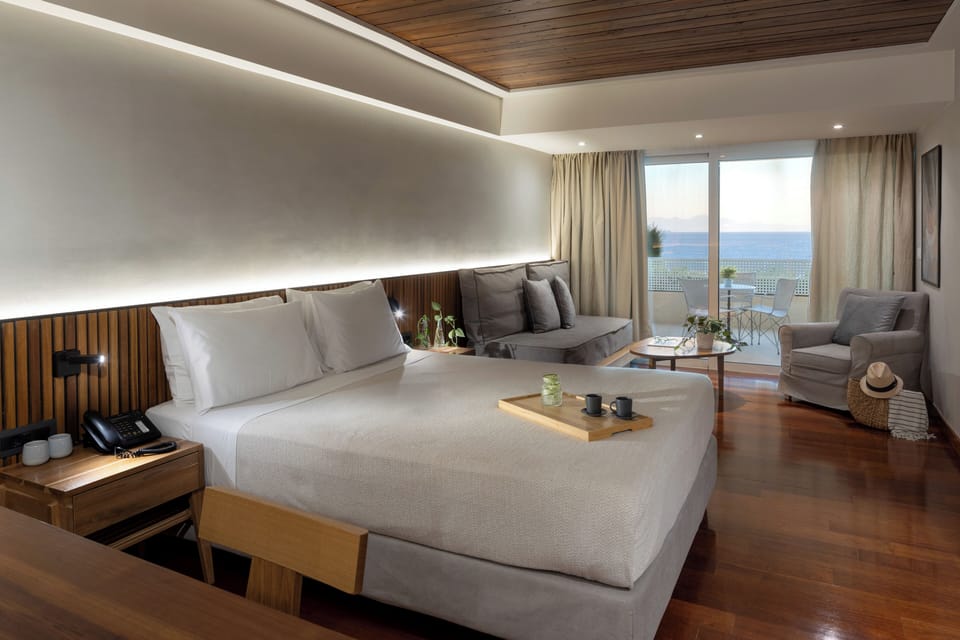Junior Suite, Sea View | Hypo-allergenic bedding, in-room safe, free WiFi, bed sheets