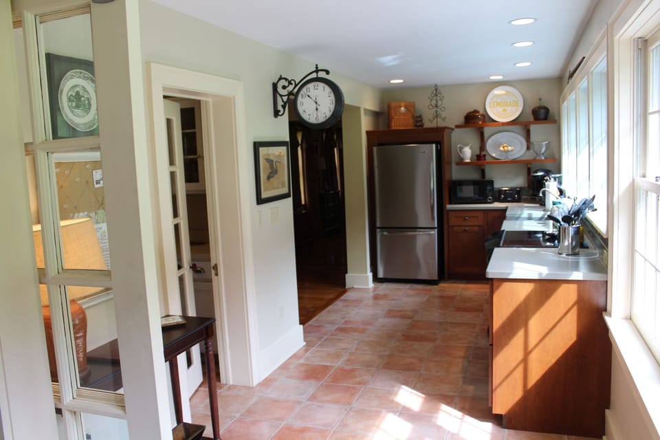 Kitchen looking past Pantry on left, thru to dinning room and livening room.