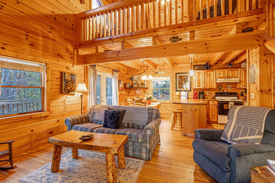 Open living room/ kitchen in log home