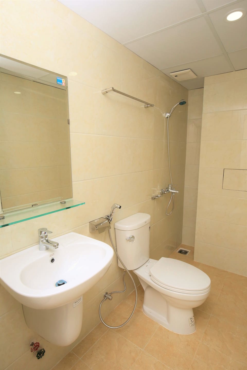 Shower, free toiletries, hair dryer, slippers